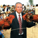 Sen. Orrin Hatch (R-UT) inspects fighting birds during a cock-buying trip to Tibet.